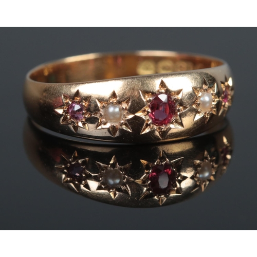 362 - An 18ct Gold, Ruby and Pearl gypsy set ring. Size O. Total weight: 2.8g