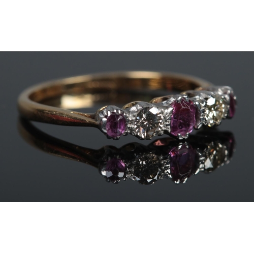 366 - An 18ct Gold five stone Ruby and Diamond ring. Size K. Total weight: 2.1g.