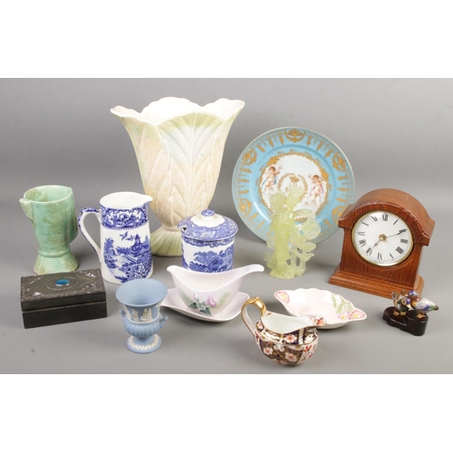 126 - A quantity of mostly ceramics. Includes Royal Crown Derby Old Imari jug, Wedgwood jasperware, mantel... 