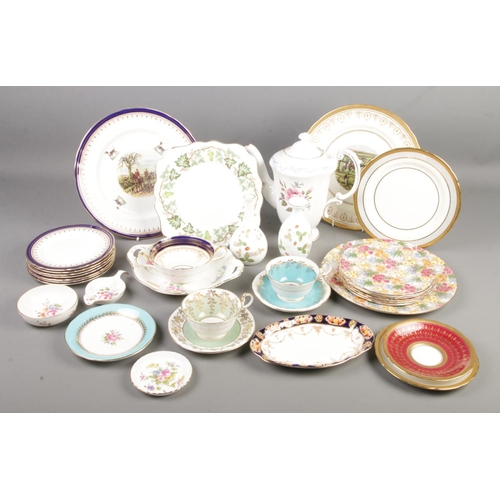 127 - A collection of bone china. Includes Aynsley, Royal Crown Derby, Royal Winton Grimwades, Wedgwood et... 