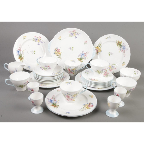 133 - A small collection of Shelley 'Wild Flowers' teawares. Includes cups & saucers, egg cups, sandwich p... 