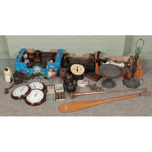 172 - Three boxes of miscellaneous. Includes lawn bowls, ornate metal table lamp, wooden stand, mincers, w... 