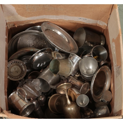 182 - A large box of metalwares. Includes pedestal bowl, teapots, wine holder, tankards, etc.