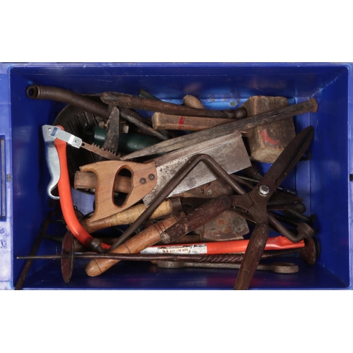 189 - A box of tools. Includes pickaxe, axes, hammers, shears, etc.