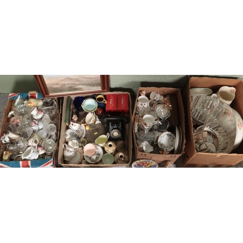 215 - Four boxes of miscellaneous. Includes rotary telephones, glass scent bottles, framed print, LP and s... 