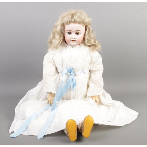 44 - A vintage bisque head doll, marked '10 SH 10 Germany', possibly Simon & Halbig. Additional stamp to ... 