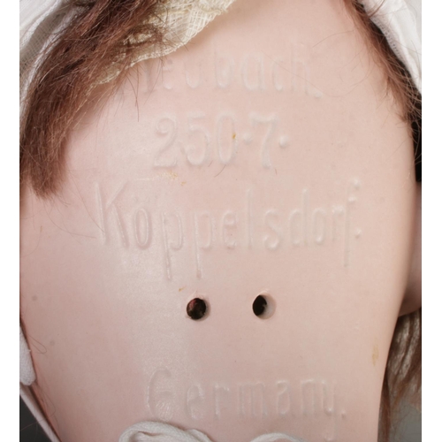 46 - A Heubach Koppelsdorf bisque head doll, marked 250.7 to the back of the head, in Victorian dress wit... 