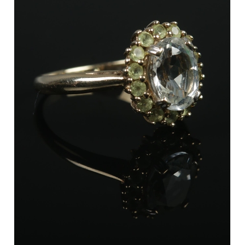 350 - A 9ct Gold cluster dress ring, set with paste and colourless stones. Size N. Total weight: 4g.