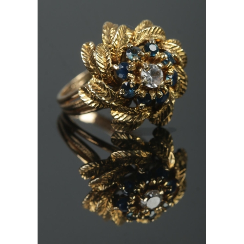 351 - A vintage 9ct Gold and Sapphire cluster floral dress ring. Assayed for London 1968. Size K½. Total w... 