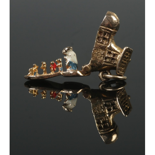 360 - A 9ct Gold charm, modelled as 'The Old Woman Who Lived In  A Shoe'. With hinged soul revealing The O... 