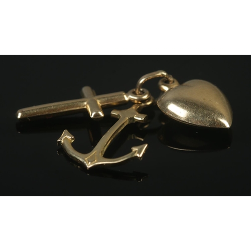 373 - A 9ct Gold 'Hope, Faith and Charity' charm. Stamped to central hoop. Total weight: 1.9g