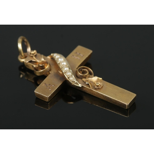 382 - An Edwardian 15ct Gold and pearl crucifix. Engraved A and H to the front. Assayed Birmingham, 1907. ... 