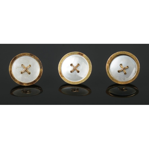 385 - A cased set of six 9ct Gold and Mother of Pearl buttons, in fitted case. Stamped 9ct and GAF to the ... 