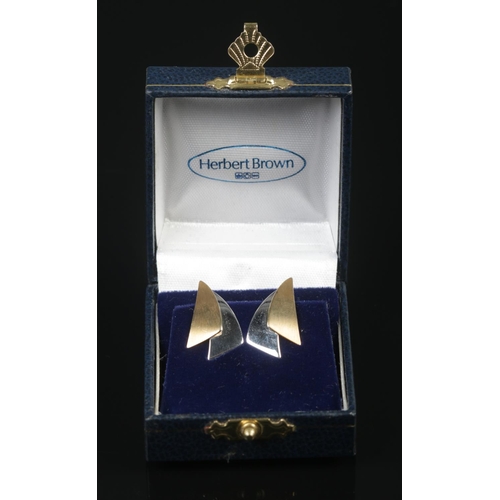 386 - A pair of 9ct Gold two-tone clip on earrings, assayed for Edinburgh, with makers mark DC. Total weig... 
