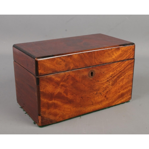 95 - A Regency mahogany tea caddy.