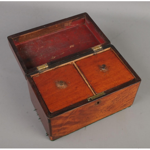 95 - A Regency mahogany tea caddy.