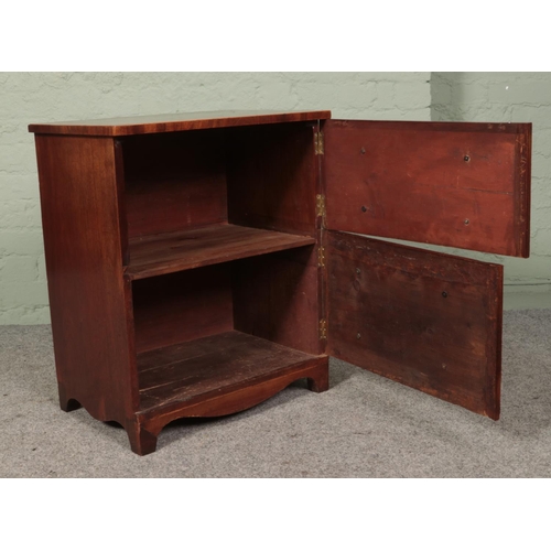 458 - A Georgian mahogany chest converted to a cupboard with satin wood inlay. 69cm x 58.5cm x 38.5cm.