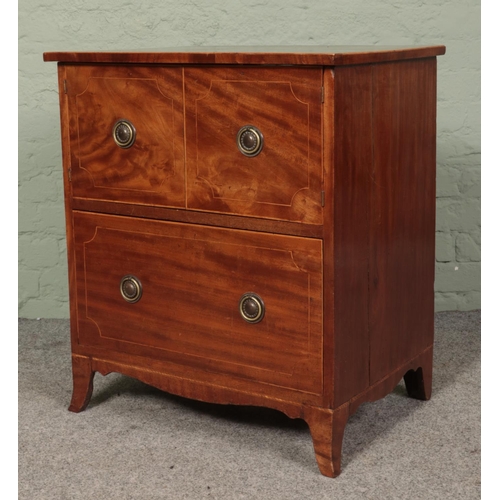 459 - A Georgian mahogany cabinet with cupboard top and drawer base. 75cm x 66cm x 46cm.