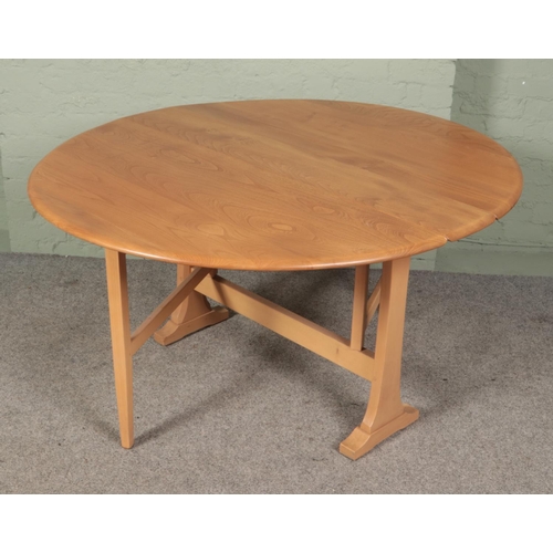 463 - An Ercol Sutherland style table.