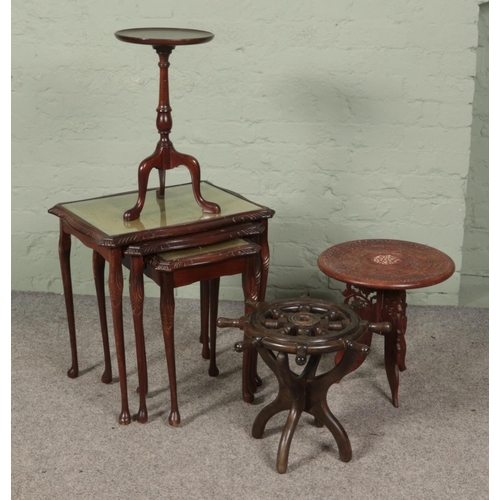 465 - Four small occasional tables. Includes nest of three tables, ships wheel example, small wine table a... 