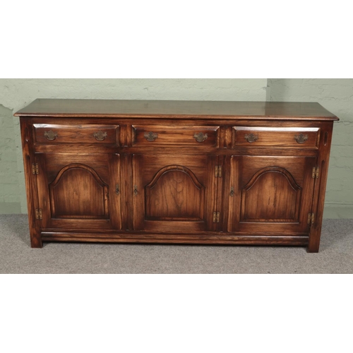 478 - Hunter and Smallpage of York large oak sideboard featuring three drawers with three lower cupboard d... 