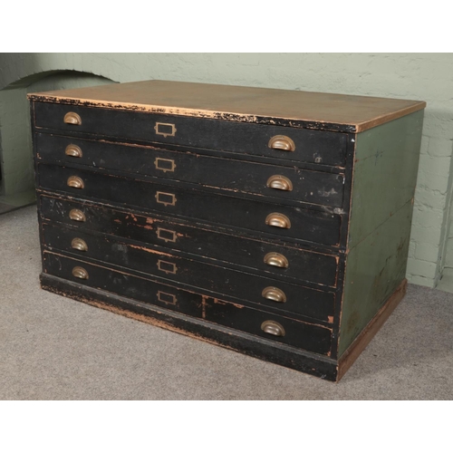 488 - An early/mid 20th century plan chest in two sections with painted body and six fitted draws with bra... 