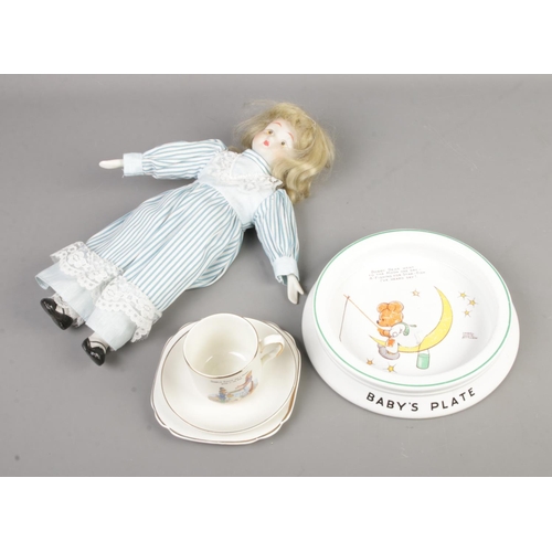 121 - A vintage child's porcelain doll along with Shelley babies/nursery plate and Empire child's nursery ... 