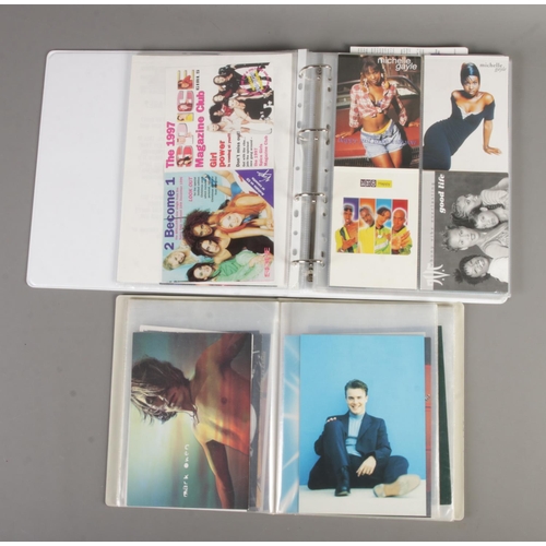 22 - A large collection of postcards of pop music interest (mostly 1990's) together with a Madonna video ... 