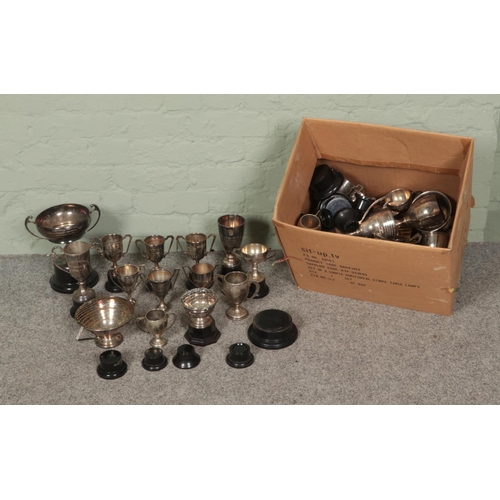 150 - A large collection of silver plate and EPNS trophies most engraved with corresponding stands.