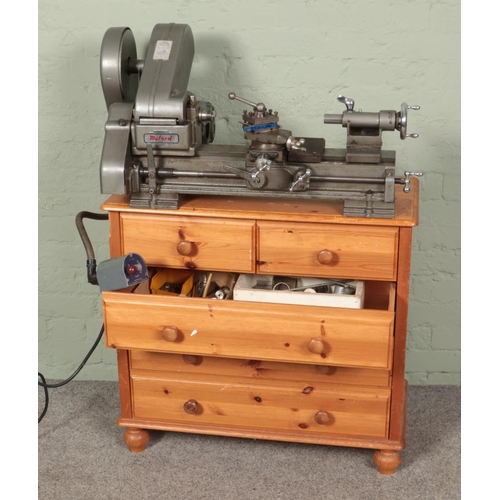 3 - A Myford ML10 Lathe on pine chest of drawers with multiple accessories.