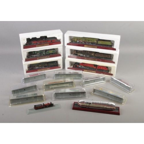 193 - A quantity of boxed collectable model locomotives with some unboxed examples 17.