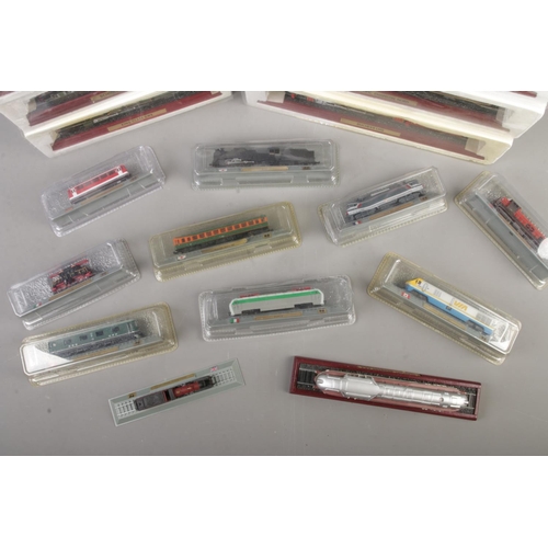 193 - A quantity of boxed collectable model locomotives with some unboxed examples 17.