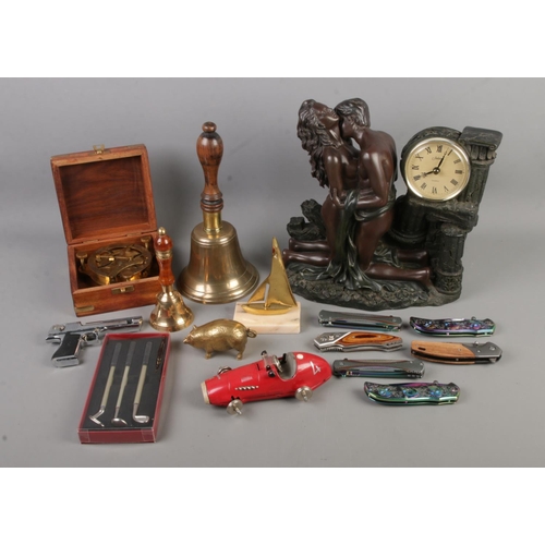 70 - A selection of collectables to include Juliana quartz figural clock, brass school bell, Schuco Grand... 