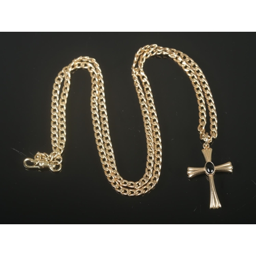 312 - A 9ct gold crucifix pendant on chain featuring central inset stone. Total weight 11.17g.