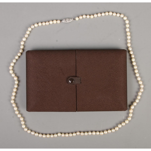 347 - A boxed cultured pearl necklace. Approx. length when closed 39cm.