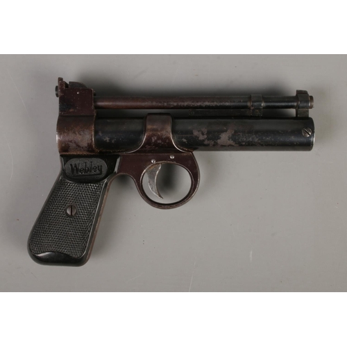 406 - A Webley & Scott The Webley Junior .177 cal air pistol featuring  chequered grips. CANNOT POST OVERS... 