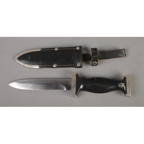 418 - A possibly WWII Ern by Solingen black panther dagger featuring etched inscription to blade. With ori... 