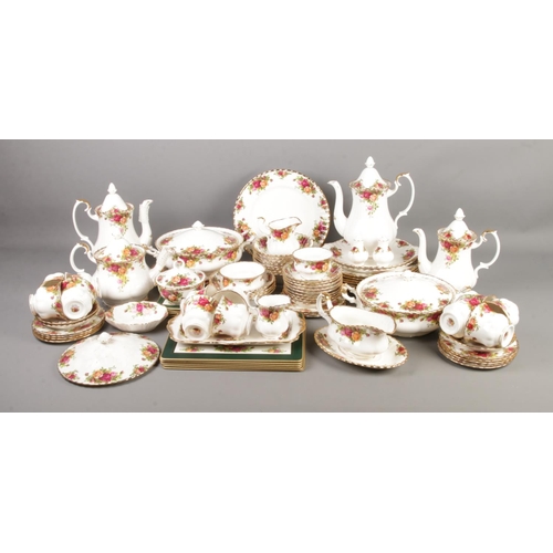 88 - A Royal Albert Old Country Roses tea service to include two tureens, teapot, several coffee pots, su... 