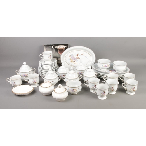 92 - A collection of Denby dinner wares in the Lorraine pattern along with small quantity of Royal Albert... 