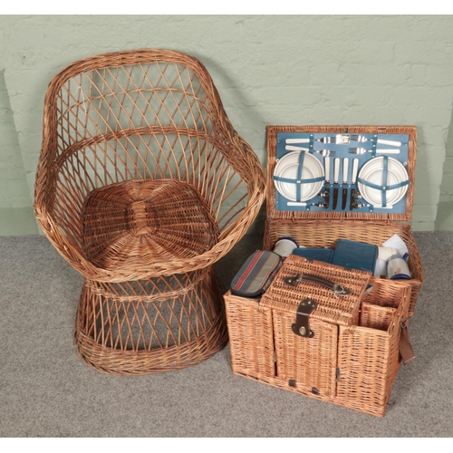 446 - A wicker tub chair along with two wicker picnic sets include Optima example.