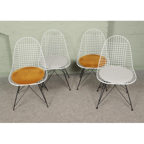 447 - Four Concorde Interiors wire chairs featuring upholstered seats.