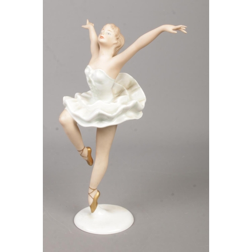 13 - A Wallendorf porcelain figure of a ballet dancer. Height 22cm.