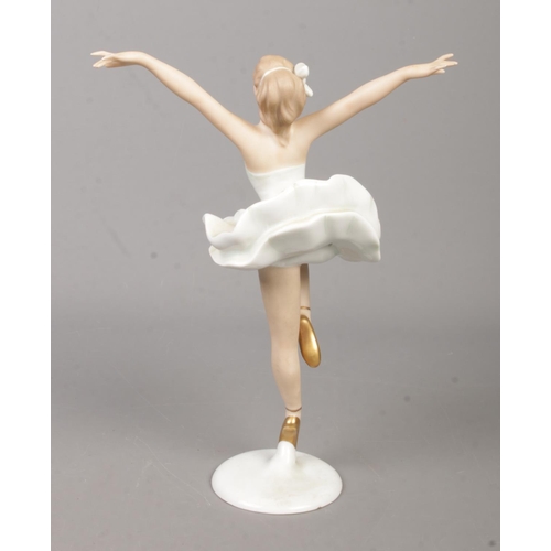 13 - A Wallendorf porcelain figure of a ballet dancer. Height 22cm.