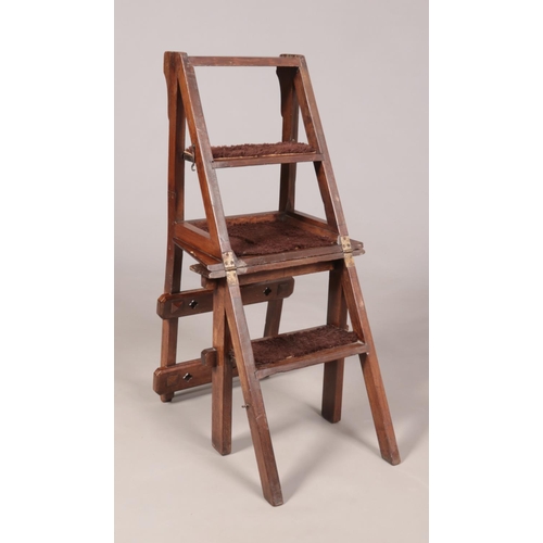 141 - An Arts & Crafts mahogany metamorphic library step chair. Height of steps 90cm.