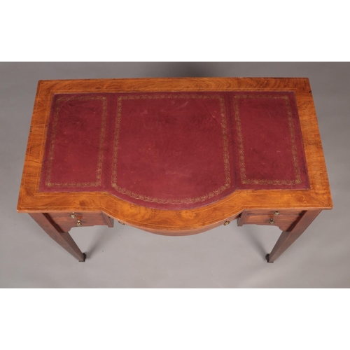 142 - An early 20th century writing desk with leather inset top and tapering supports.