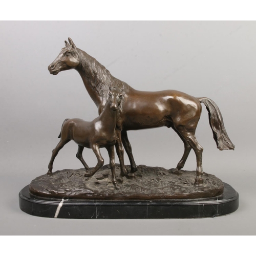 34 - Pierre-Jules Mene, a bronze figure group formed as a horse and foal, raised on marble base. Signed P... 