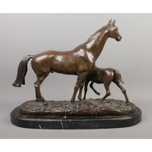 34 - Pierre-Jules Mene, a bronze figure group formed as a horse and foal, raised on marble base. Signed P... 