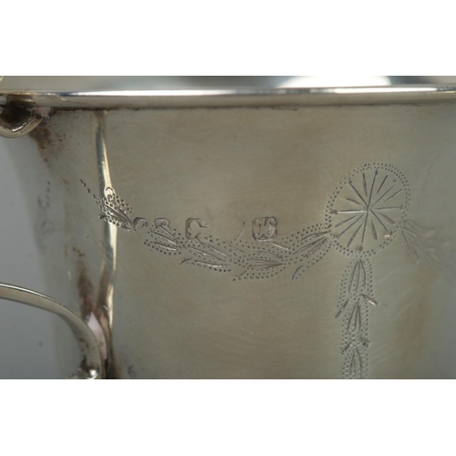 62 - An early 20th century silver cup and saucer with engraved swag and bow decoration. Assayed Chester 1... 