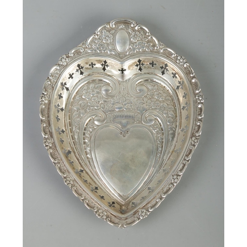 63 - A Victorian silver heart shaped dish with embossed and pierced decoration. Assayed Sheffield 1894 by... 