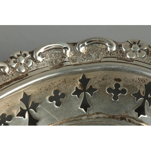 63 - A Victorian silver heart shaped dish with embossed and pierced decoration. Assayed Sheffield 1894 by... 